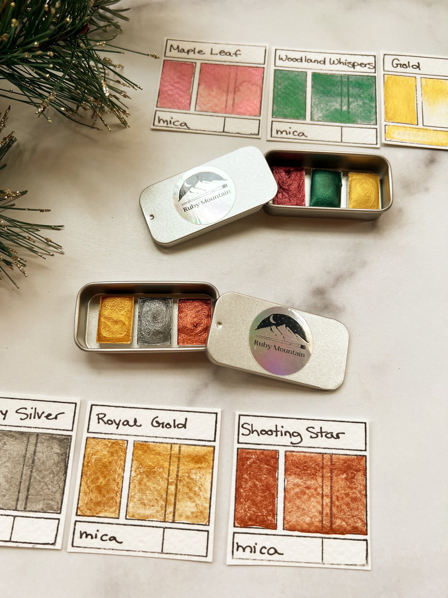 Tiny Stocking Stuffer Palettes, three mini pans of festive watercolors