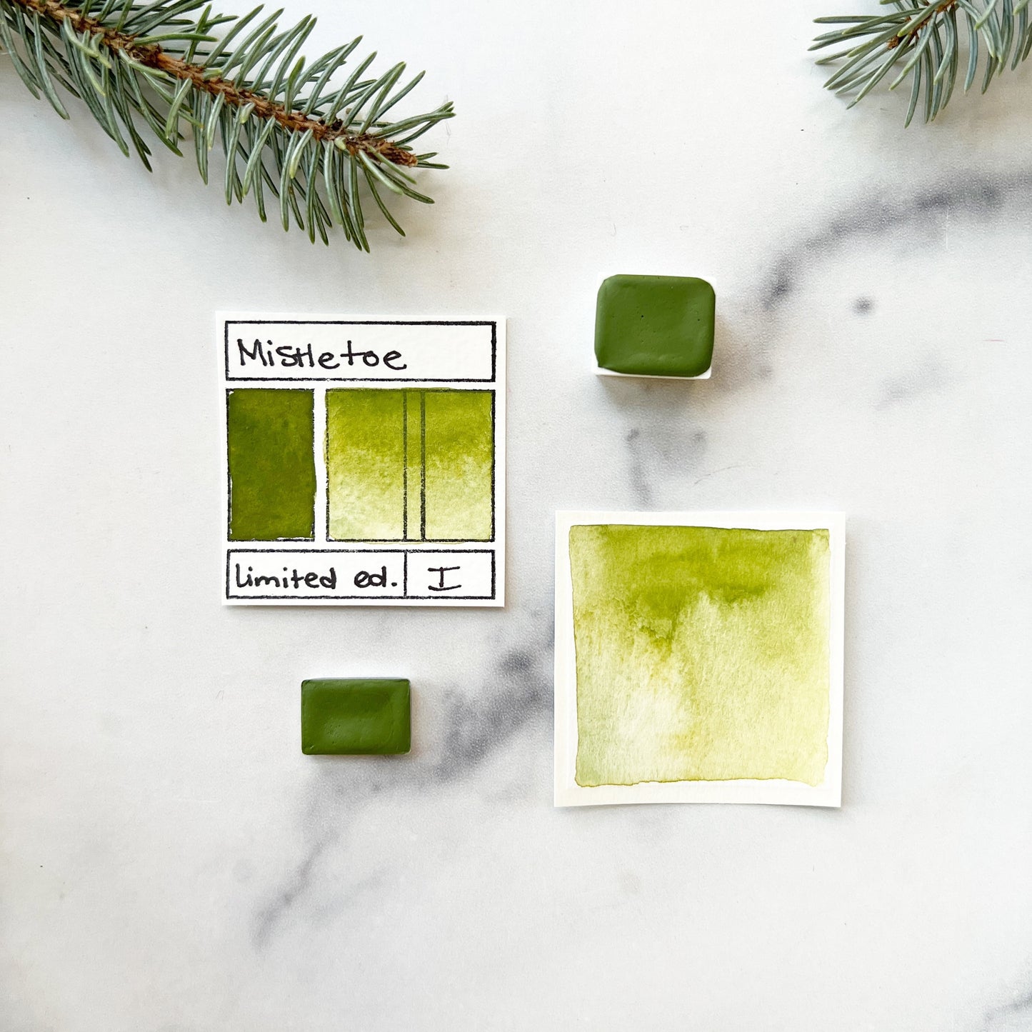 Mistletoe. Half pan, full pan or bottle cap of handmade watercolor paint