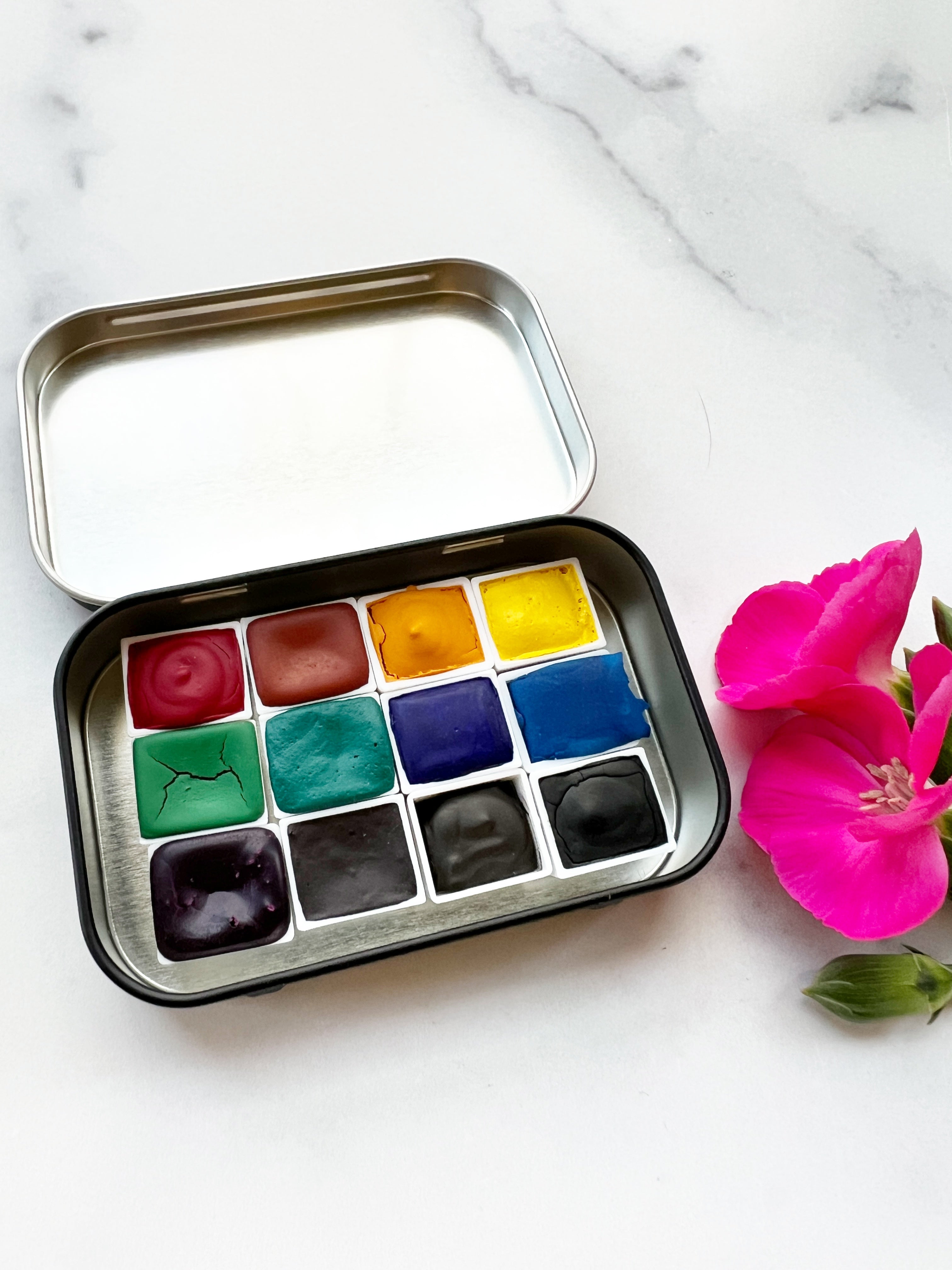 The Wild Rockies Half Pan Set, a palette of handmade watercolor paint