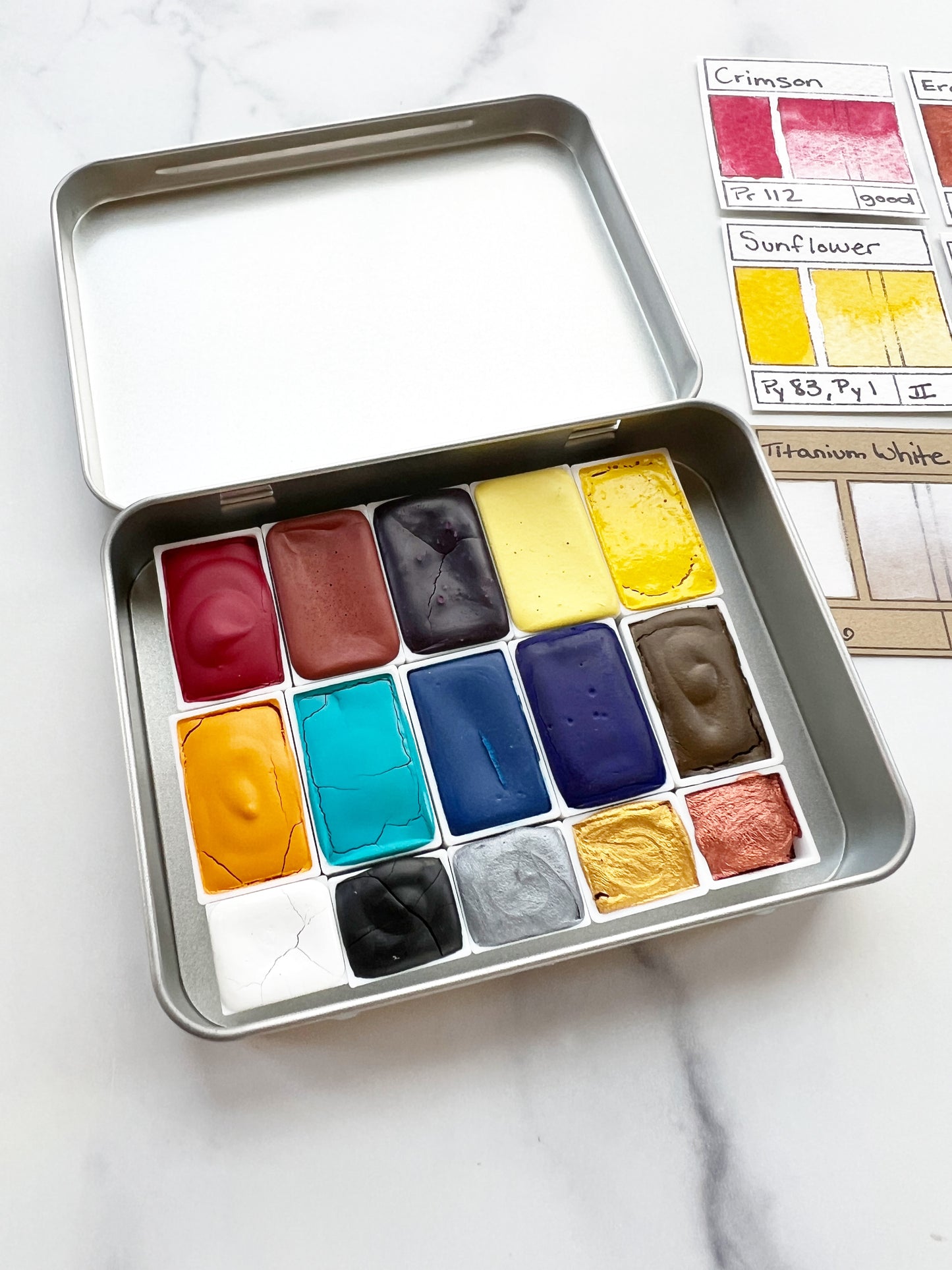 Primary 15 Palette, a fifteen color set of handmade watercolor paint