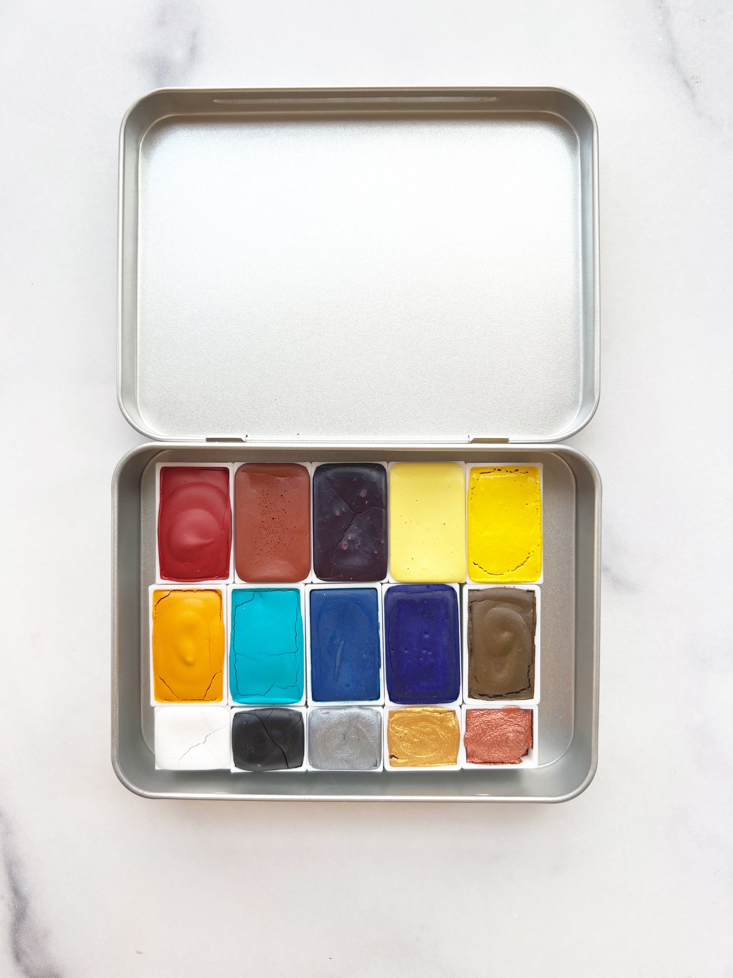 Primary 15 Palette, a fifteen color set of handmade watercolor paint