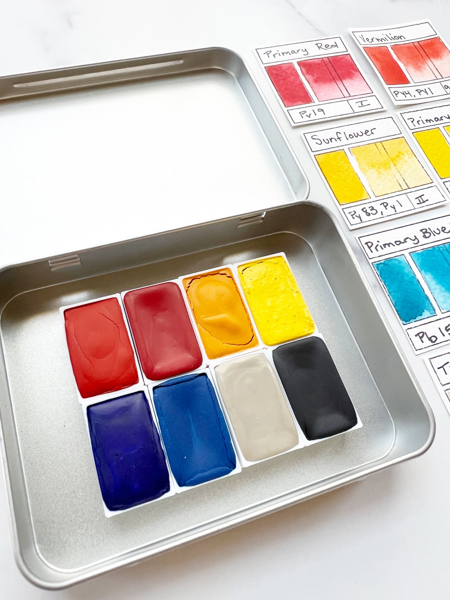 Primary 8 Full Pan Set, a full pan palette of handmade watercolor paint