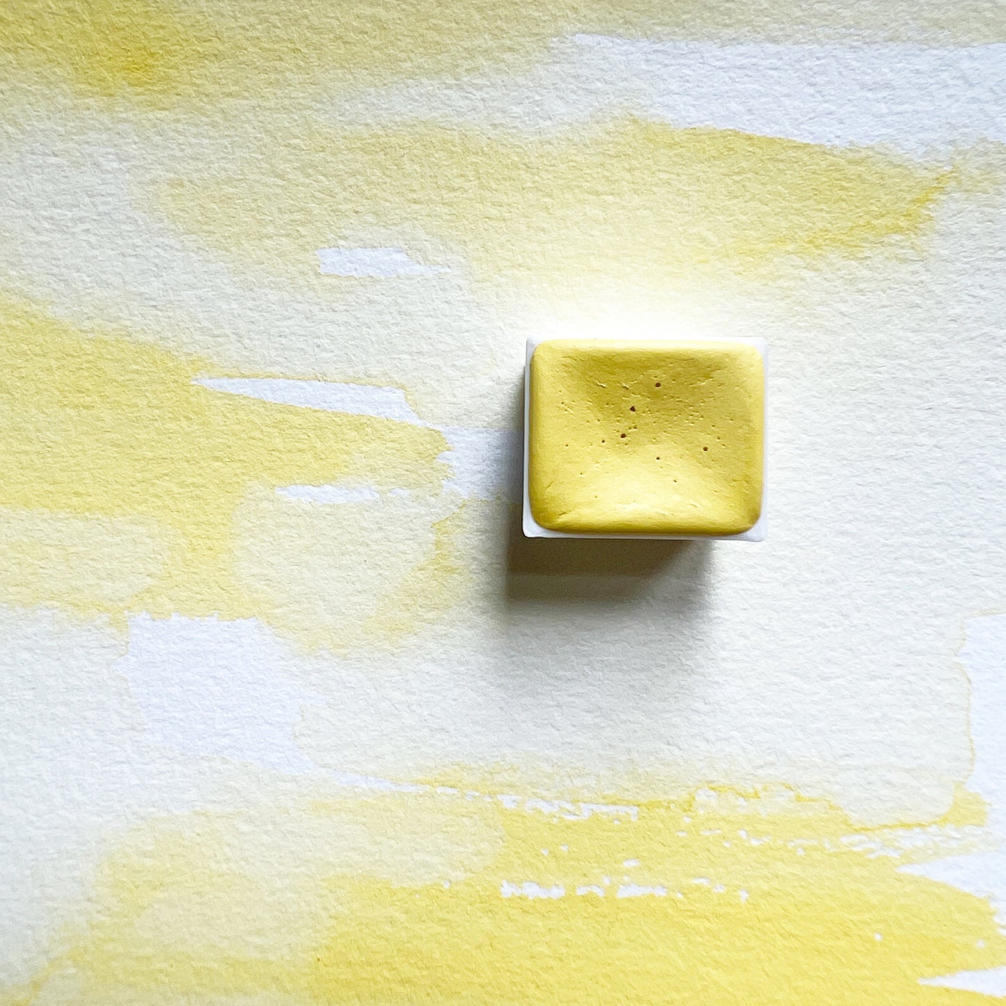 Buttercup. Half pan or bottle cap of handmade watercolor paint