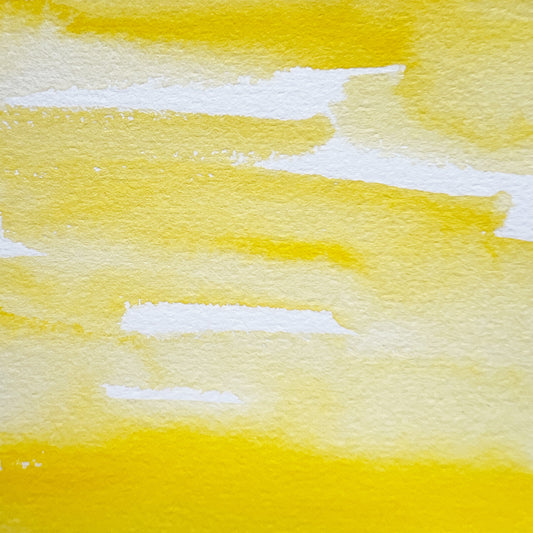 Primary Yellow. Half pan or bottle cap of handmade watercolor paint