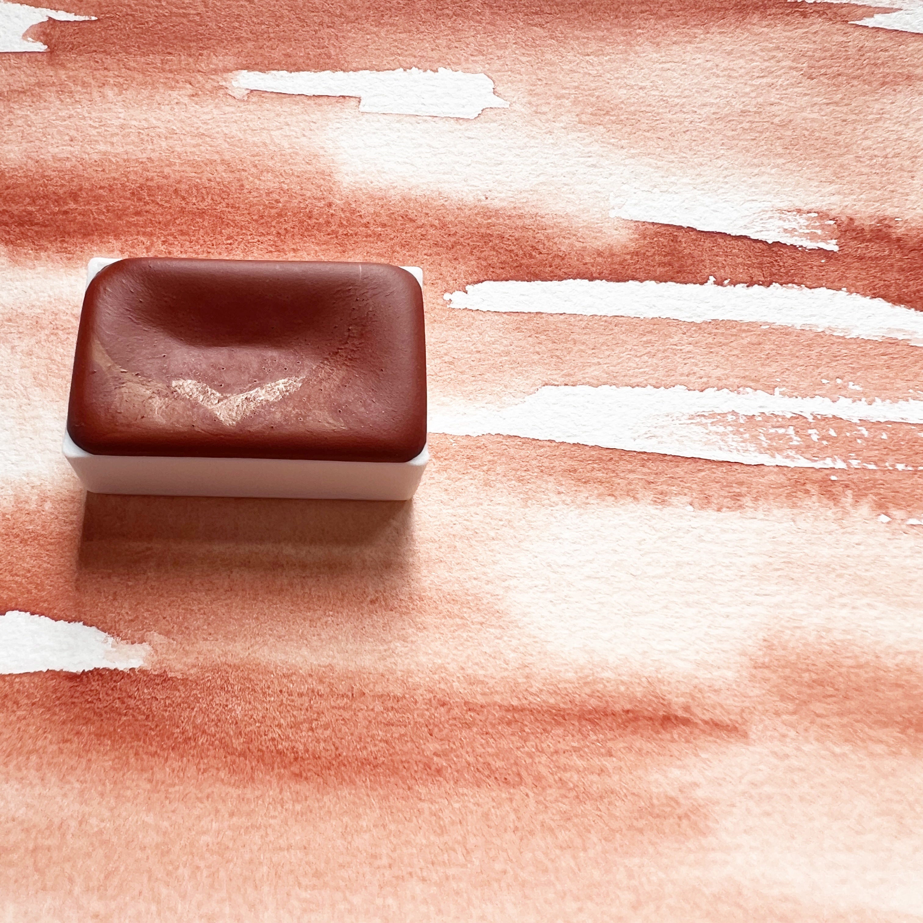 Ercolano Red. Half pan or bottle cap of handmade watercolor paint