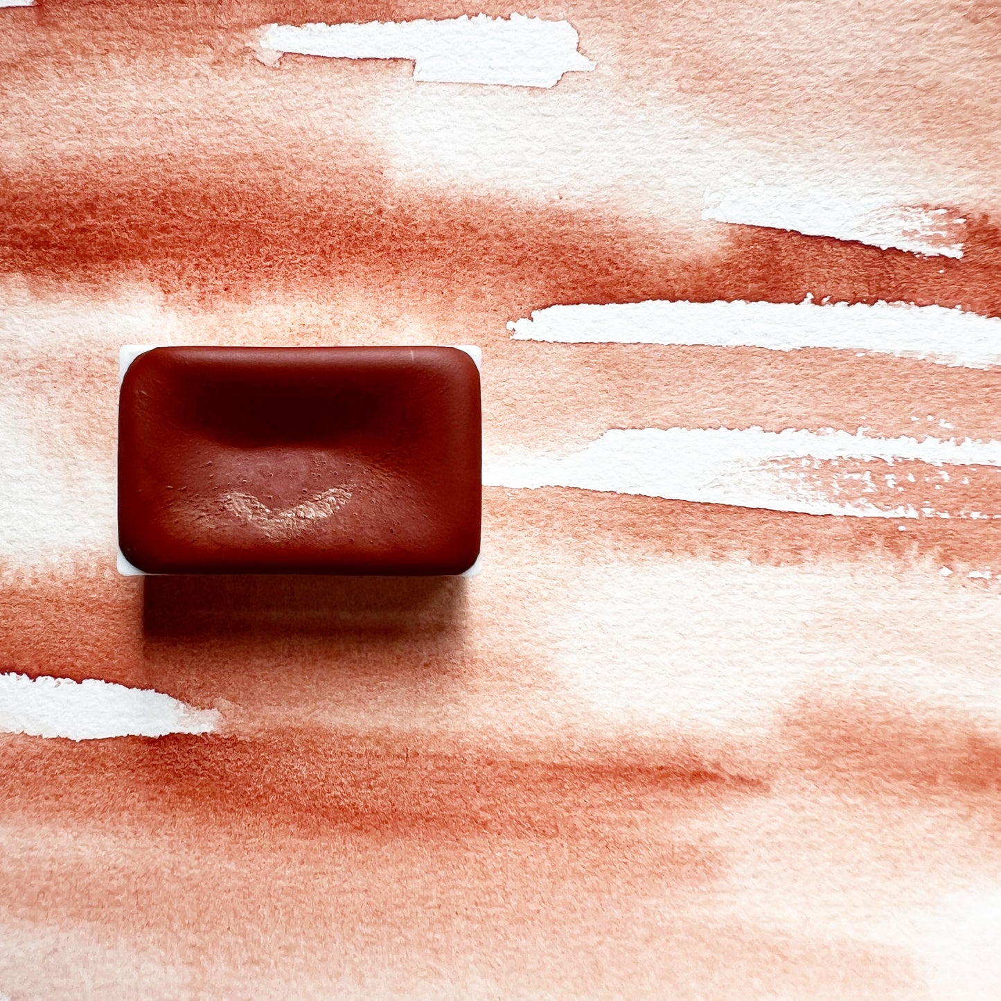 Ercolano Red. Half pan or bottle cap of handmade watercolor paint