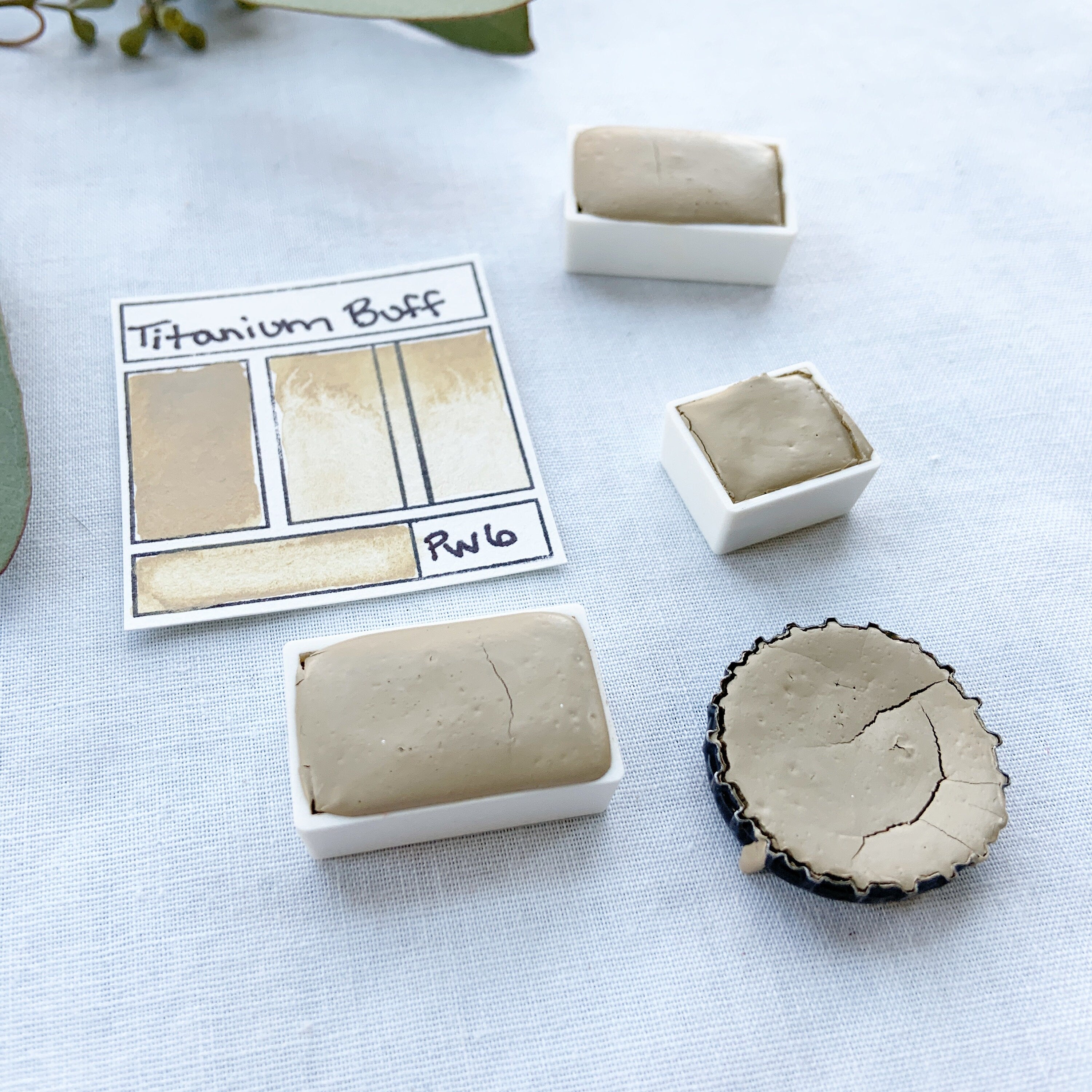 Titanium Buff. Half pan, full pan or bottle cap of handmade watercolor paint