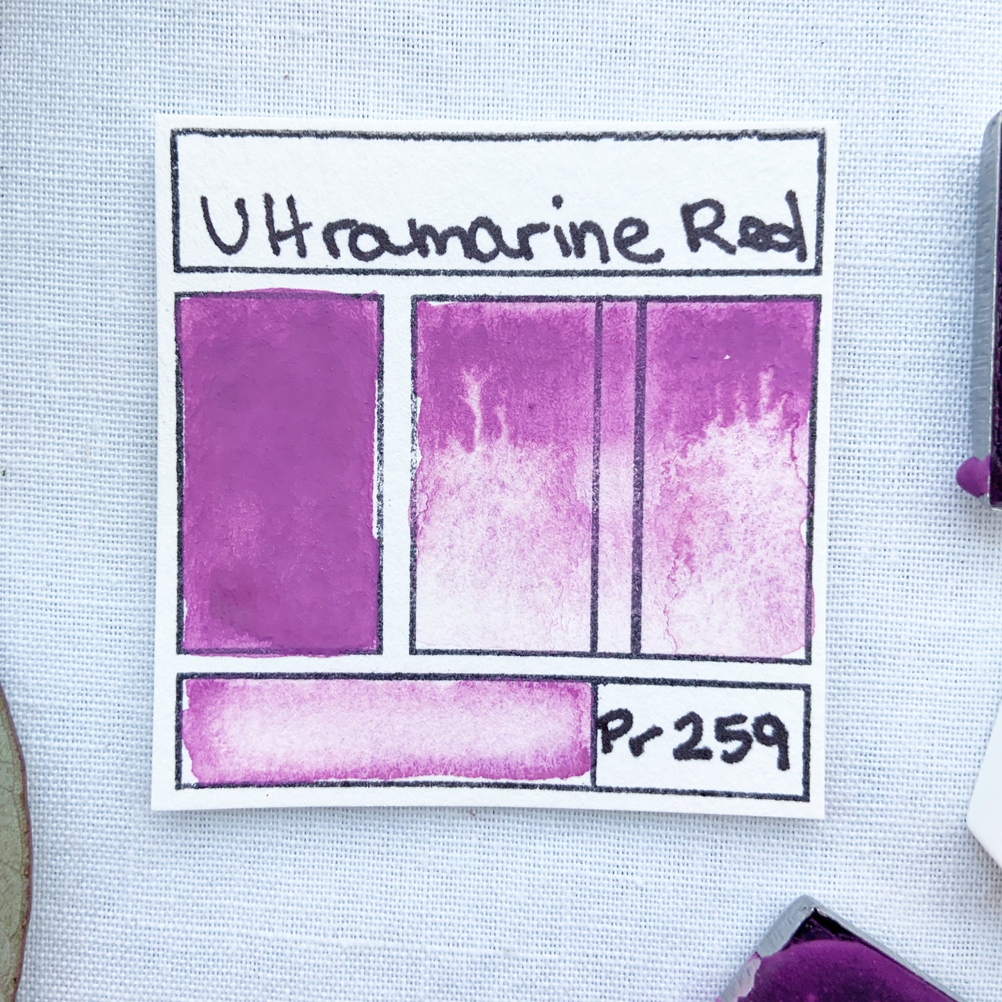 Ultramarine Red. Half pan or bottle cap of handmade ultramarine red watercolor paint