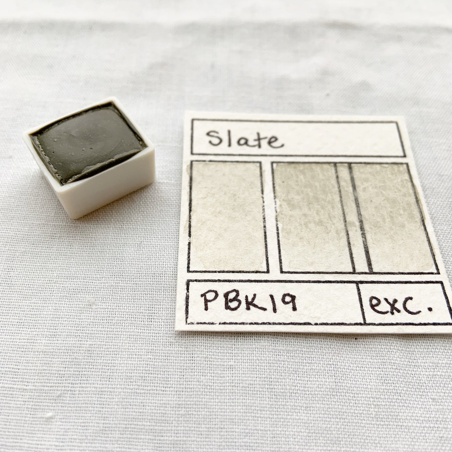 Slate. Half pan, full pan or bottle cap of handmade watercolor paint