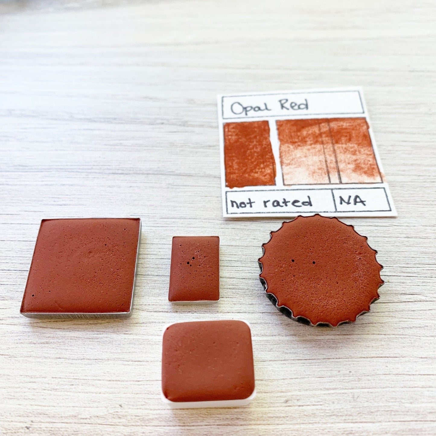 Opal Red. Half pan, full pan or bottle cap of handmade watercolor paint