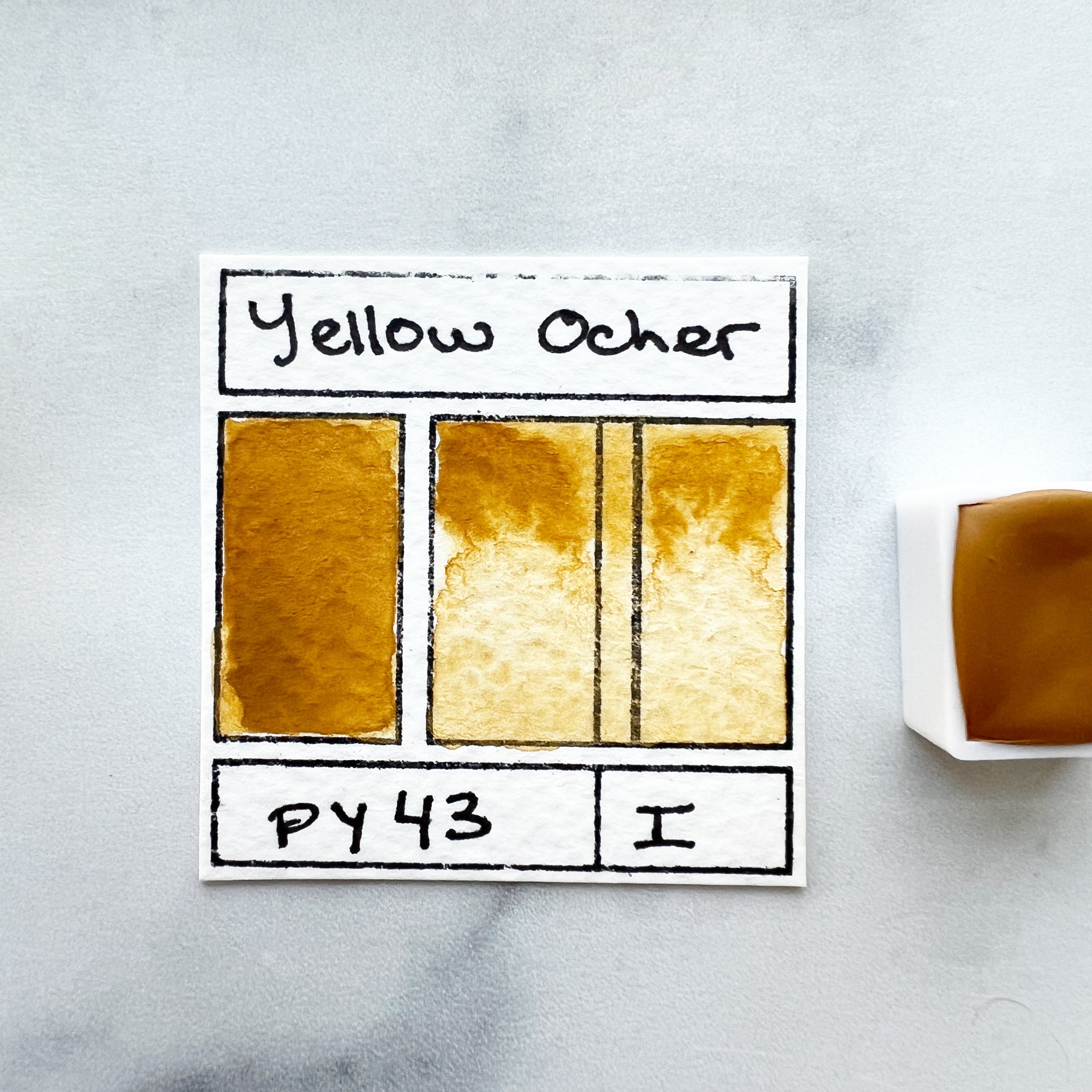 Yellow Ocher. Half pan, full pan or bottle cap of handmade watercolor paint