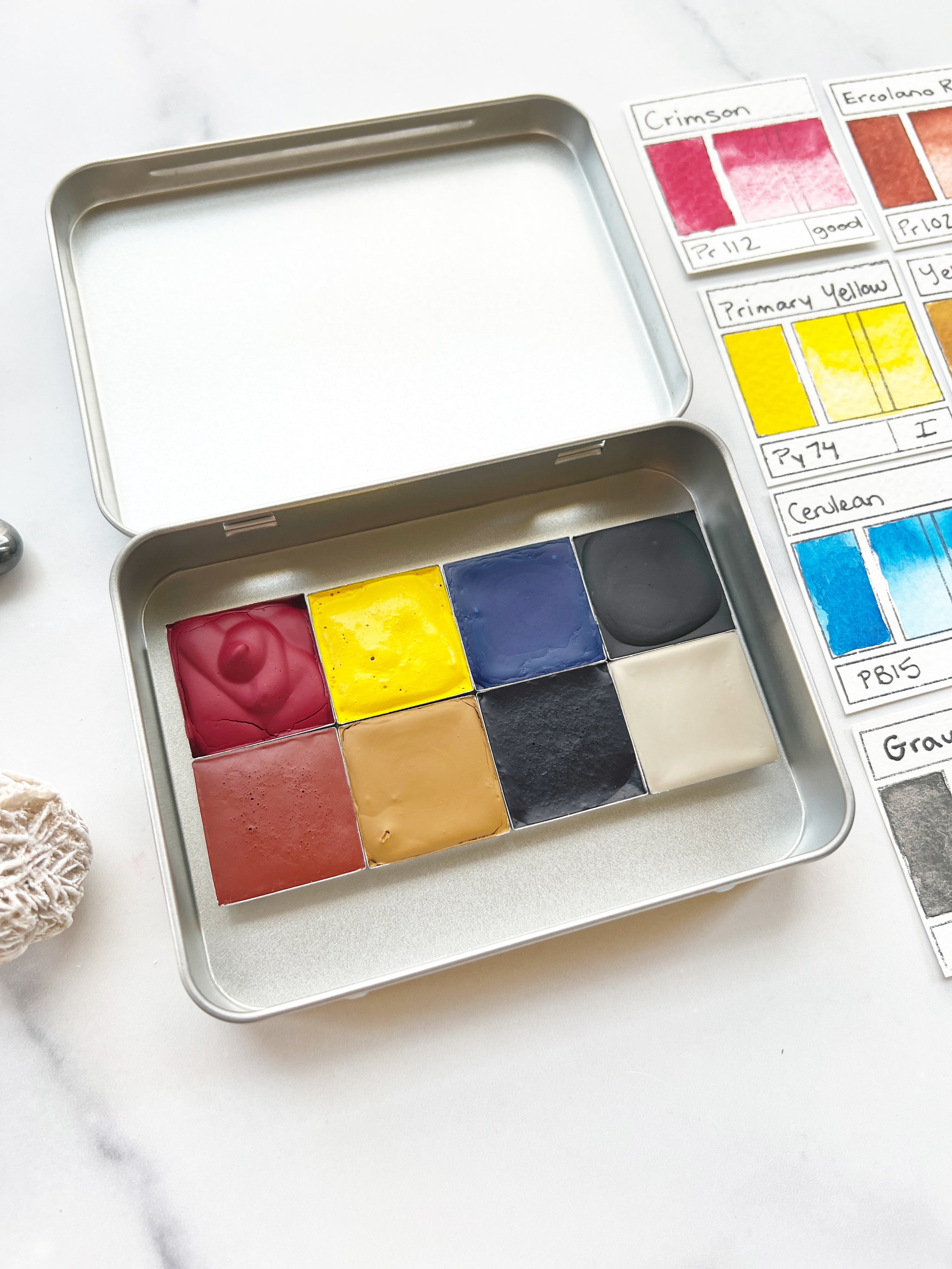 Mountain Primaries Set, an eight color palette of handmade watercolor paint