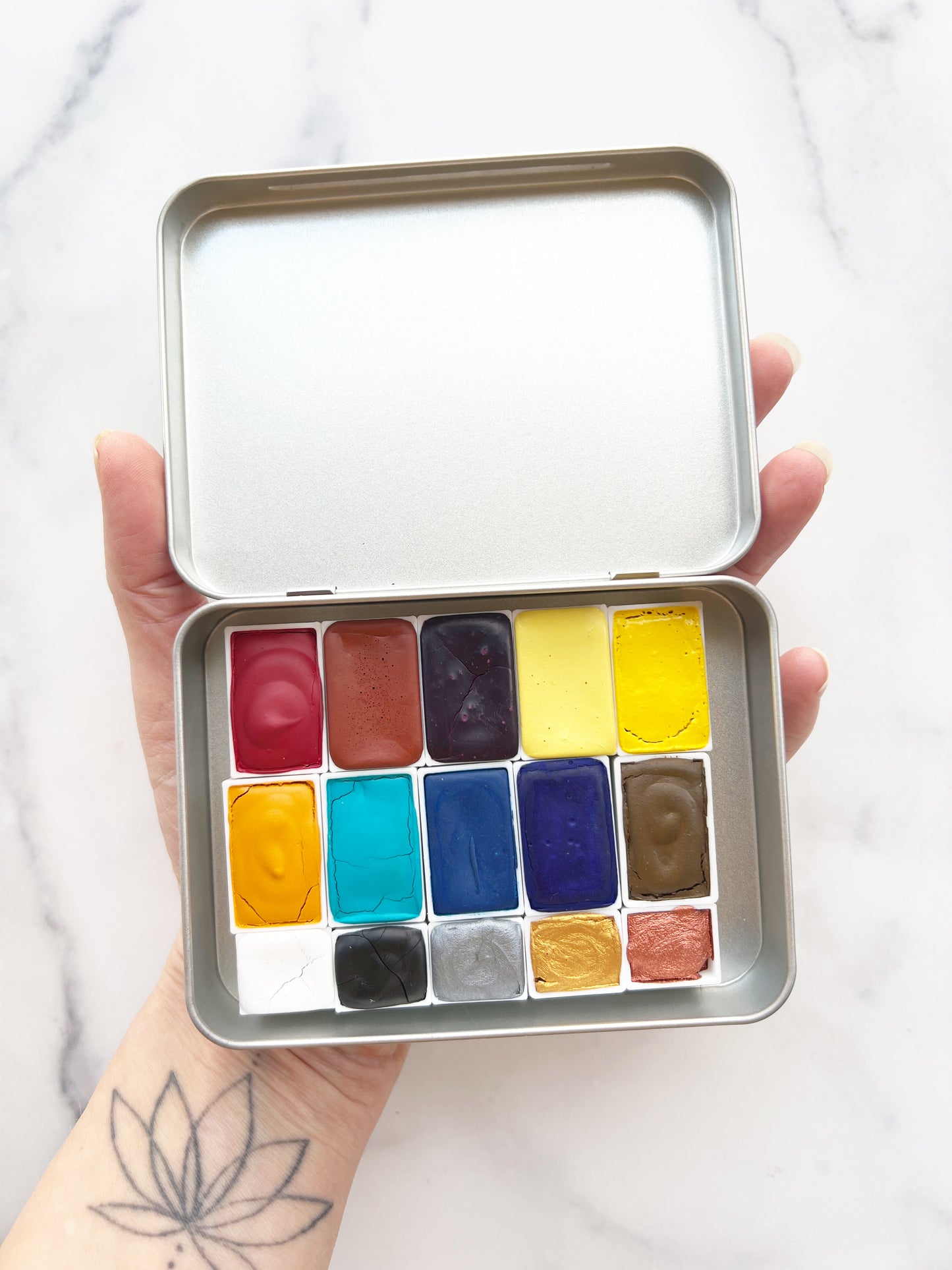 Primary 15 Palette, a fifteen color set of handmade watercolor paint