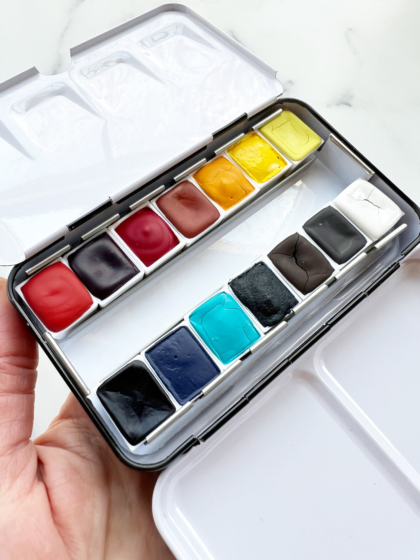 Primary 14 Paintbox, 14 half pans of watercolor paint in a black palette box