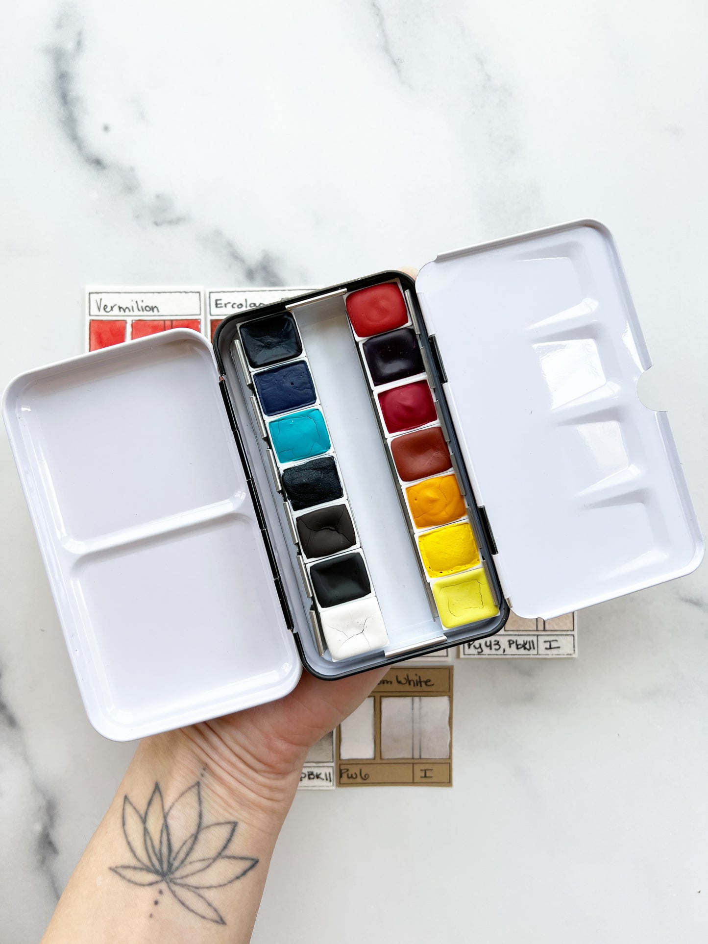 Primary 14 Paintbox, 14 half pans of watercolor paint in a black palette box
