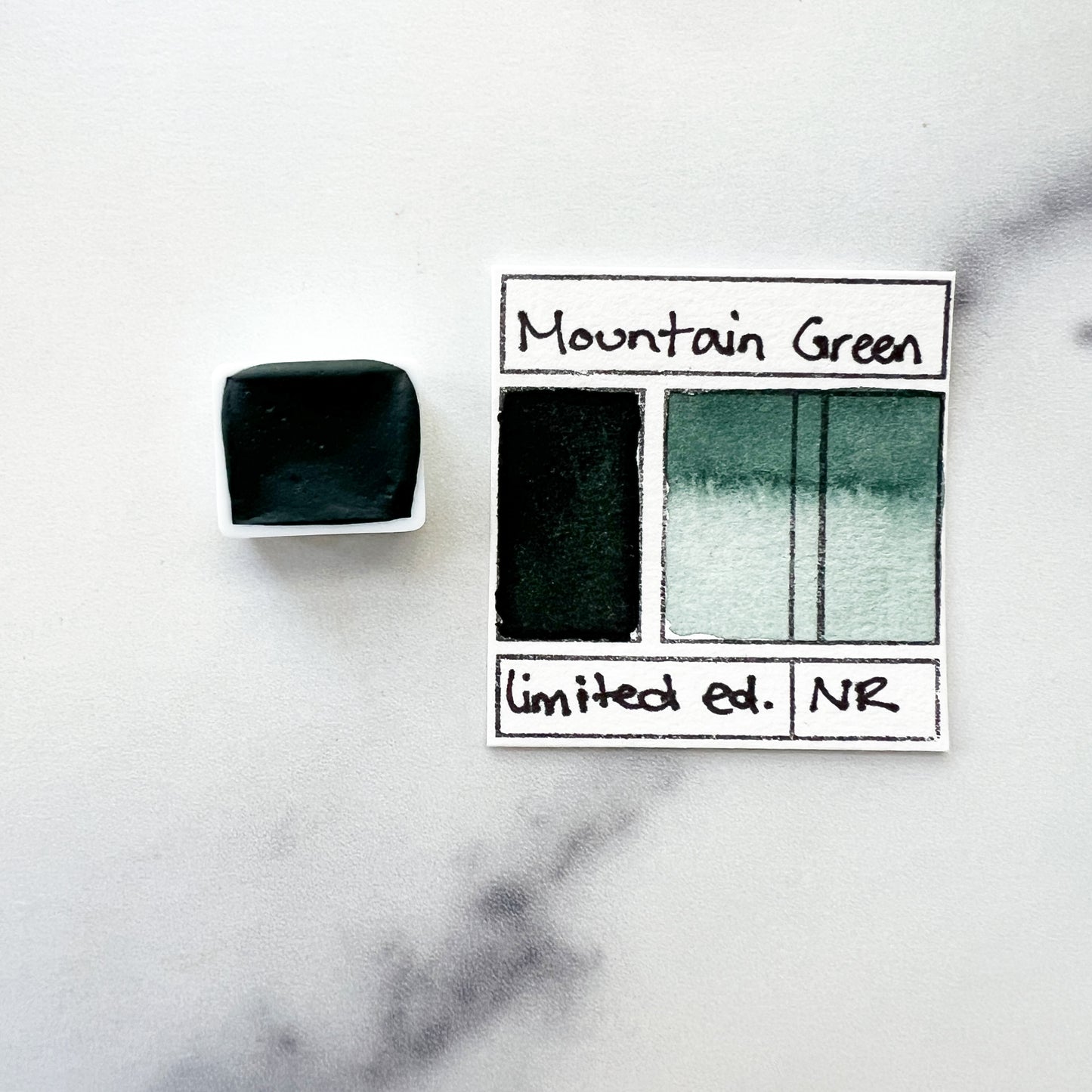 RM Mountain Green. Half pan, full pan or bottle cap of handmade watercolor paint