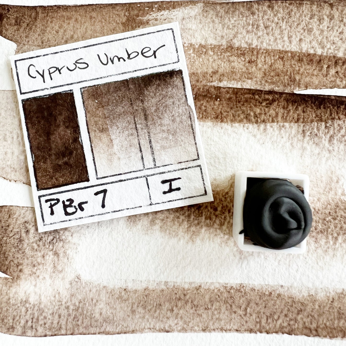 Cyprus Umber. Half pan, full pan or bottle cap of handmade watercolor paint