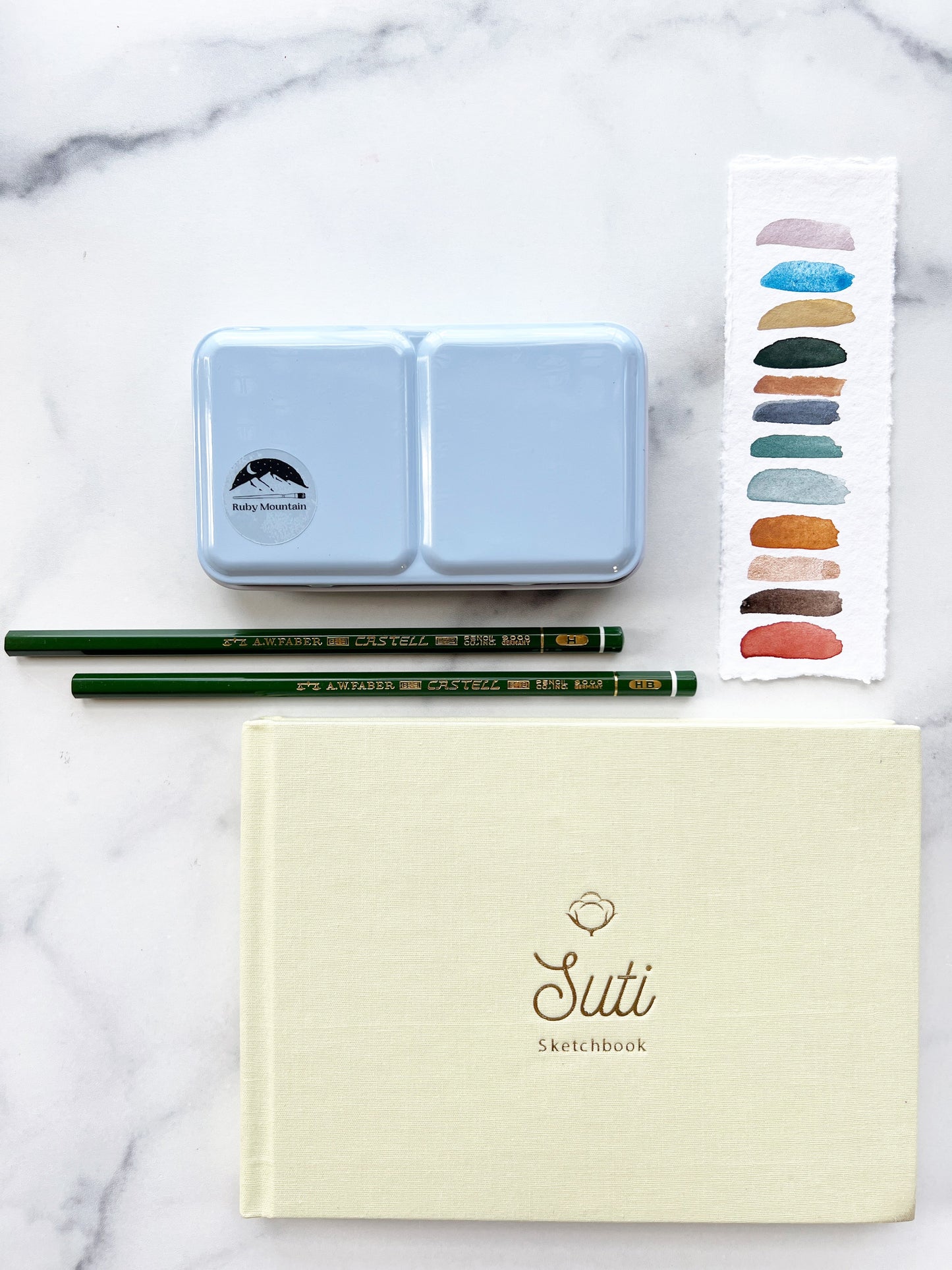 Glacial Grove Paintbox Set, a handmade watercolor set in a metal paintbox