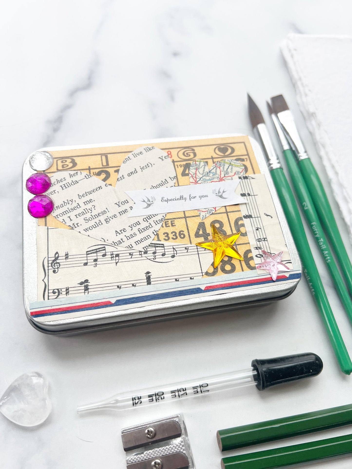 The Hilda Set, a handmade watercolor set in a collaged tin