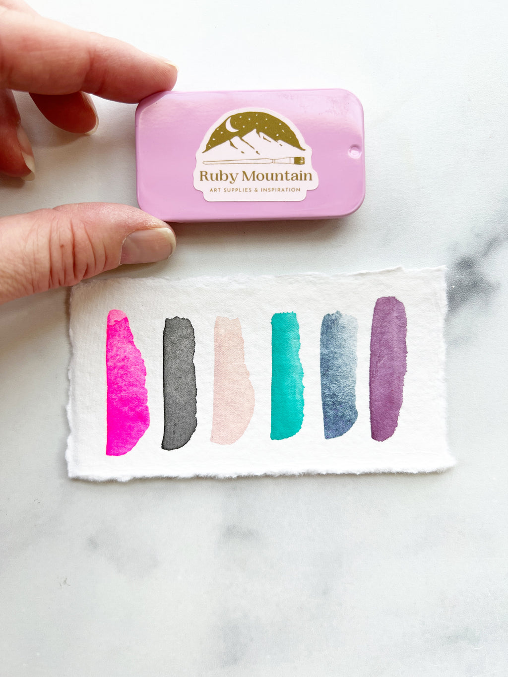 The Susan B Anthony Set, a mini pan set of handmade watercolors