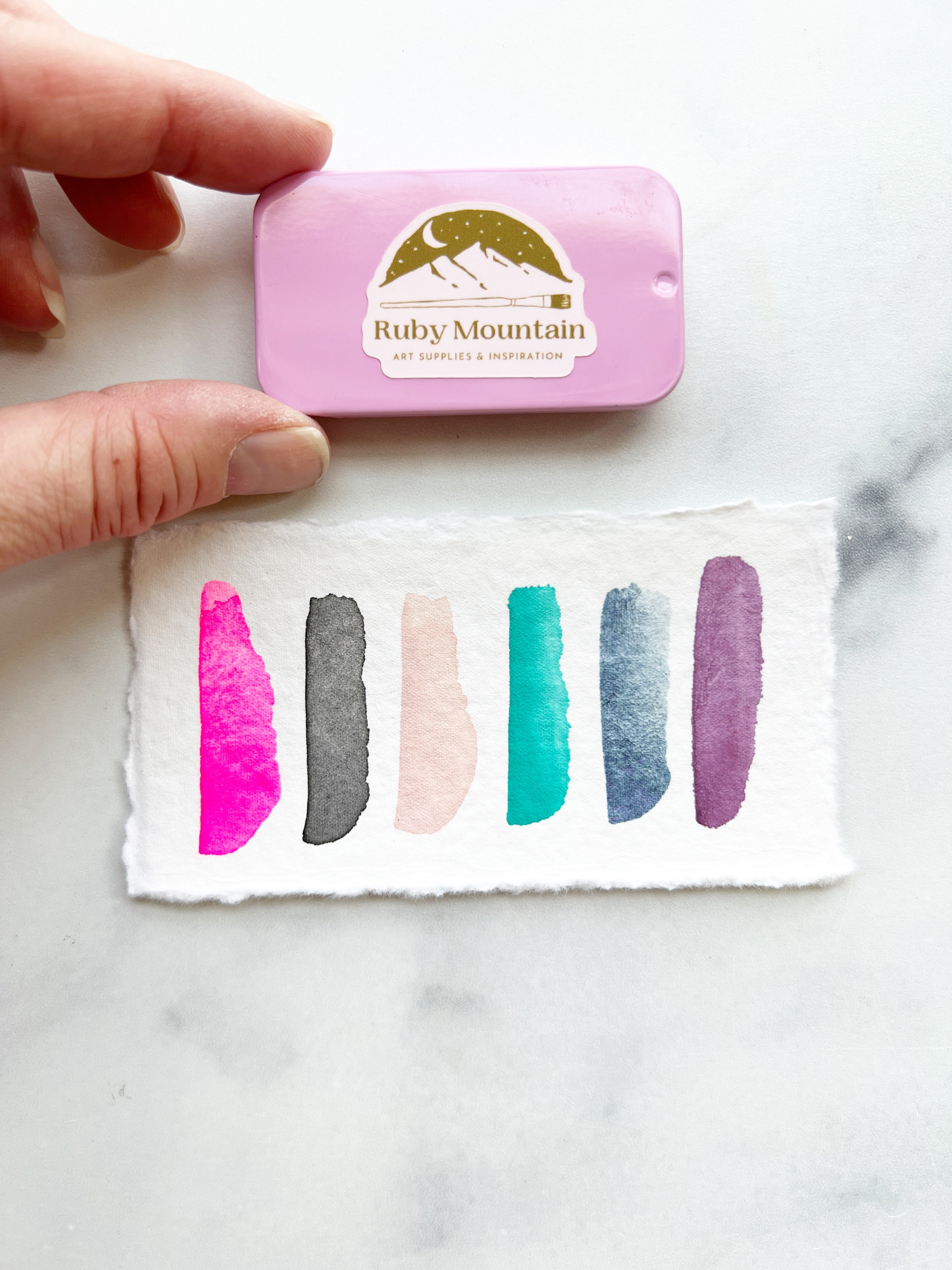 The Susan B Anthony Set, a mini pan set of handmade watercolors