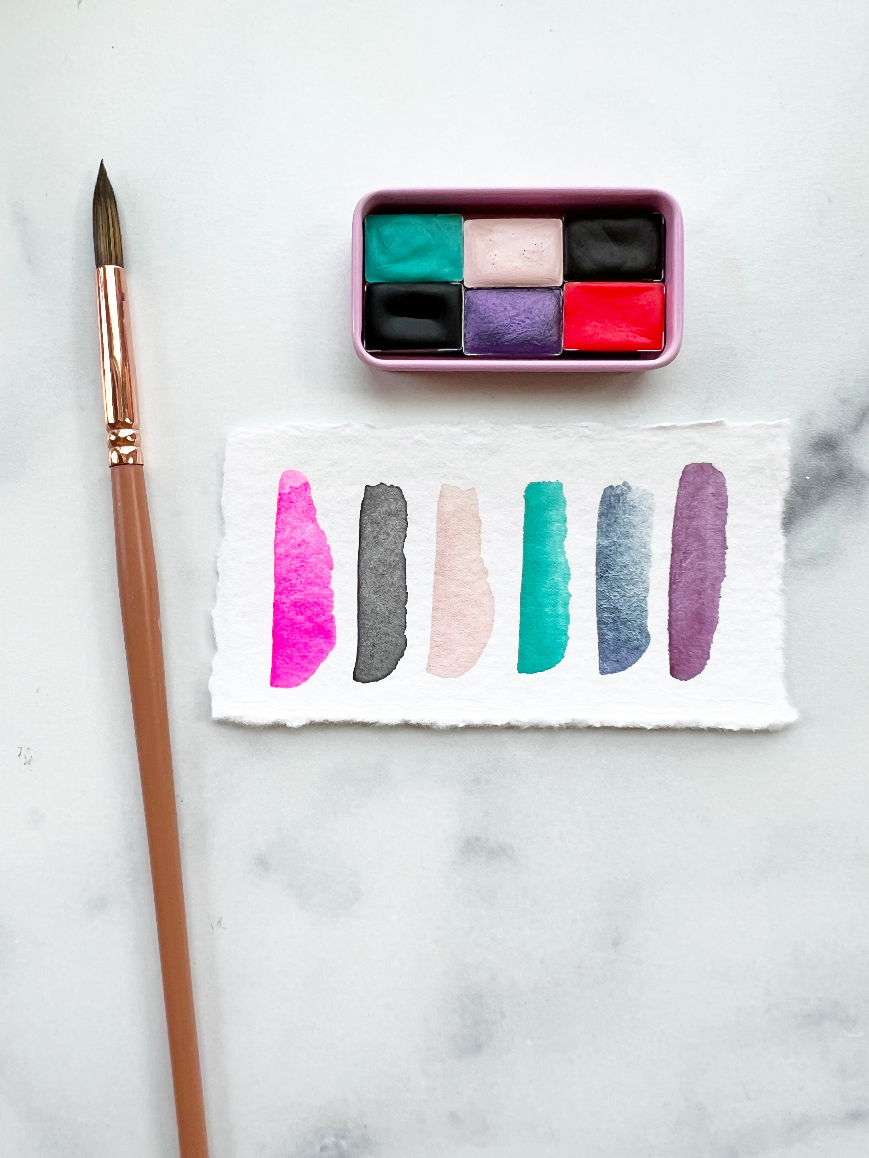 The Susan B Anthony Set, a mini pan set of handmade watercolors