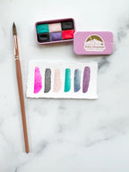 The Susan B Anthony Set, a mini pan set of handmade watercolors