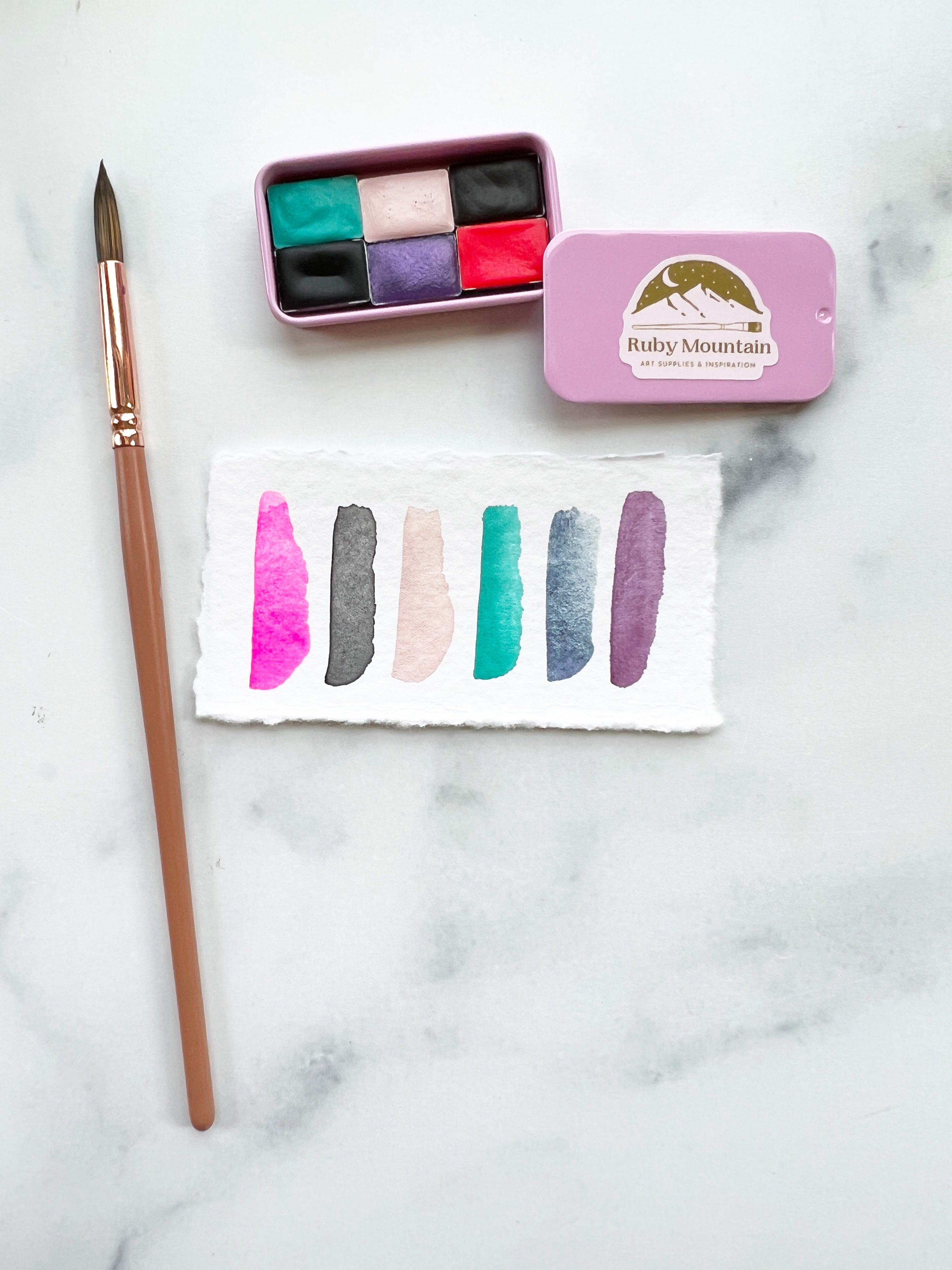 The Susan B Anthony Set, a mini pan set of handmade watercolors