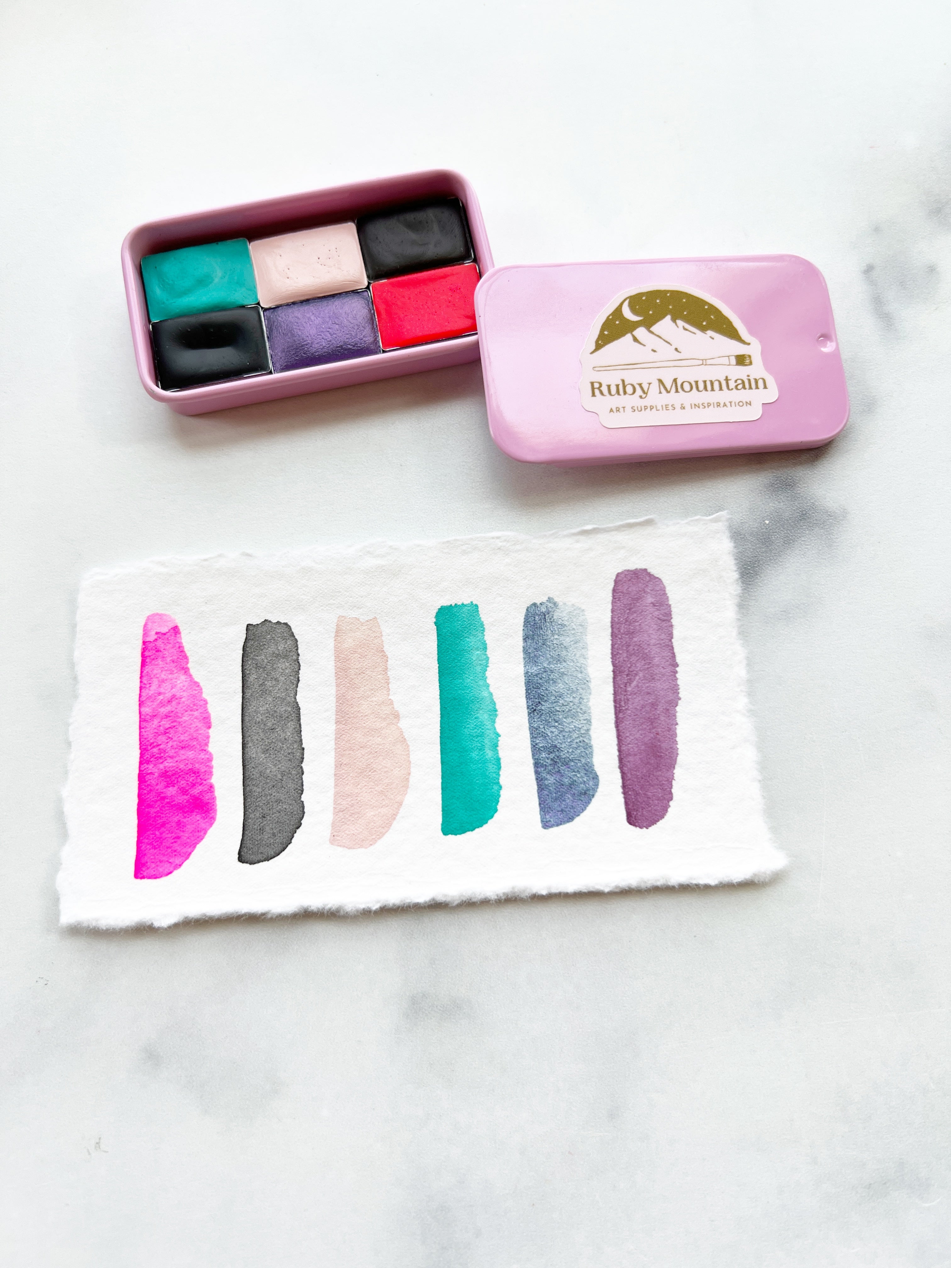 The Susan B Anthony Set, a mini pan set of handmade watercolors
