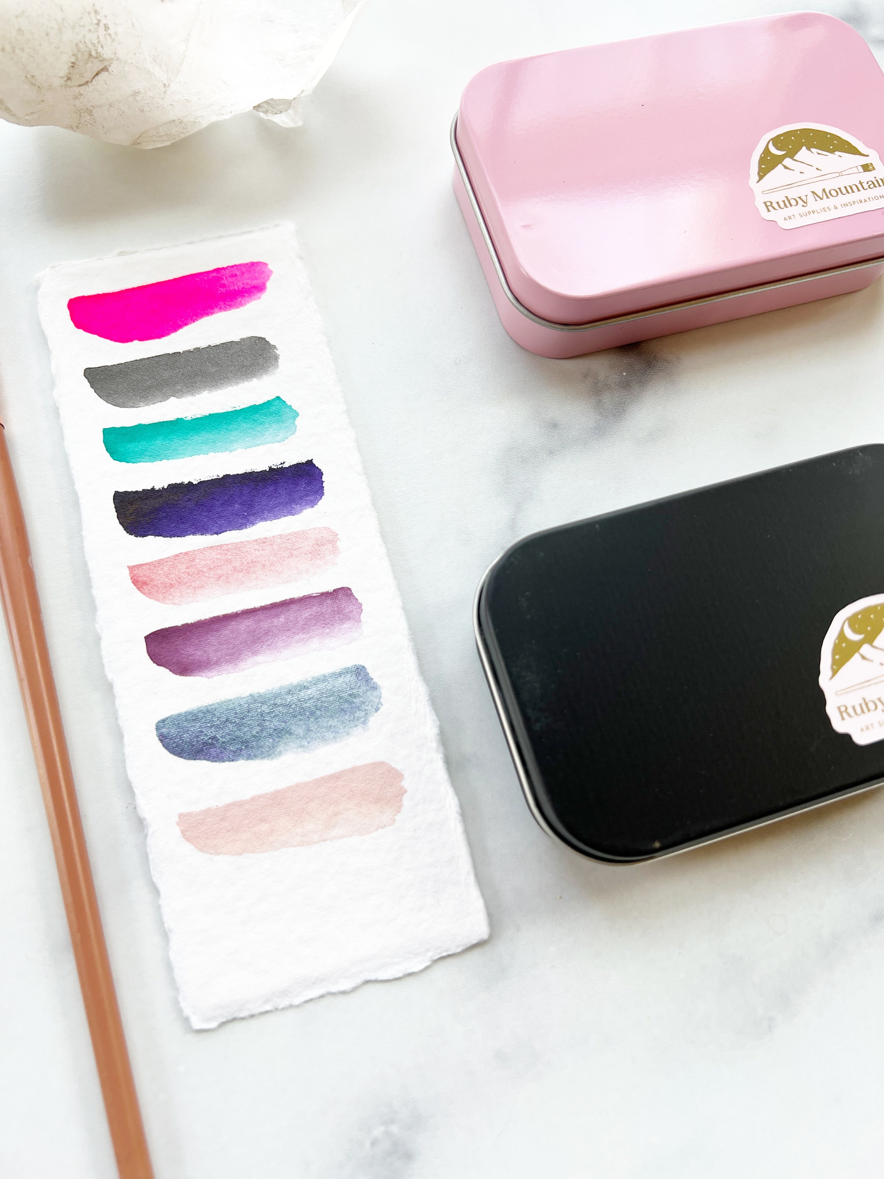 The Lucy Stone Set, a half pan set of handmade watercolors