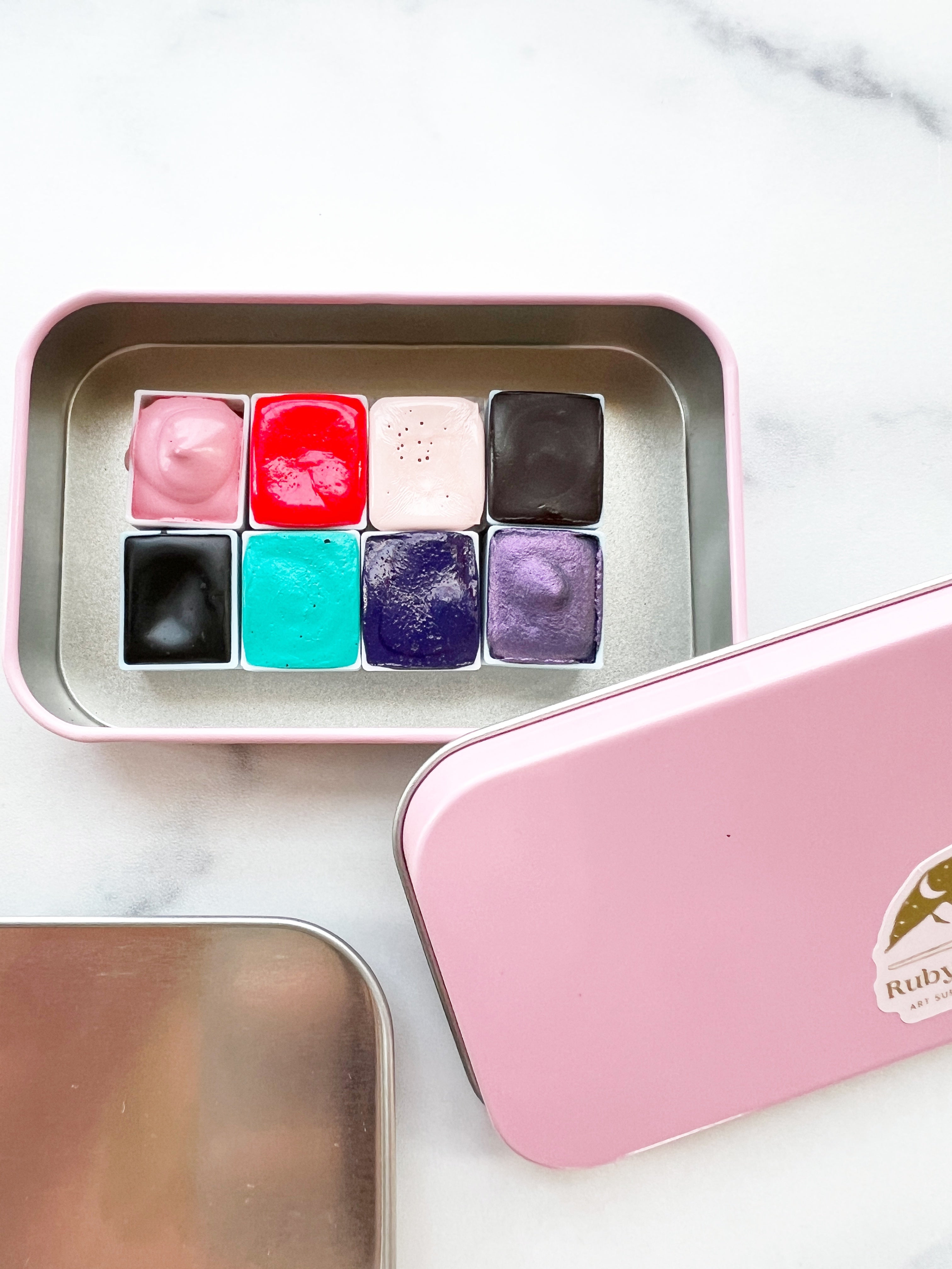The Lucy Stone Set, a half pan set of handmade watercolors