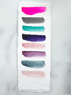 The Lucy Stone Set, a half pan set of handmade watercolors