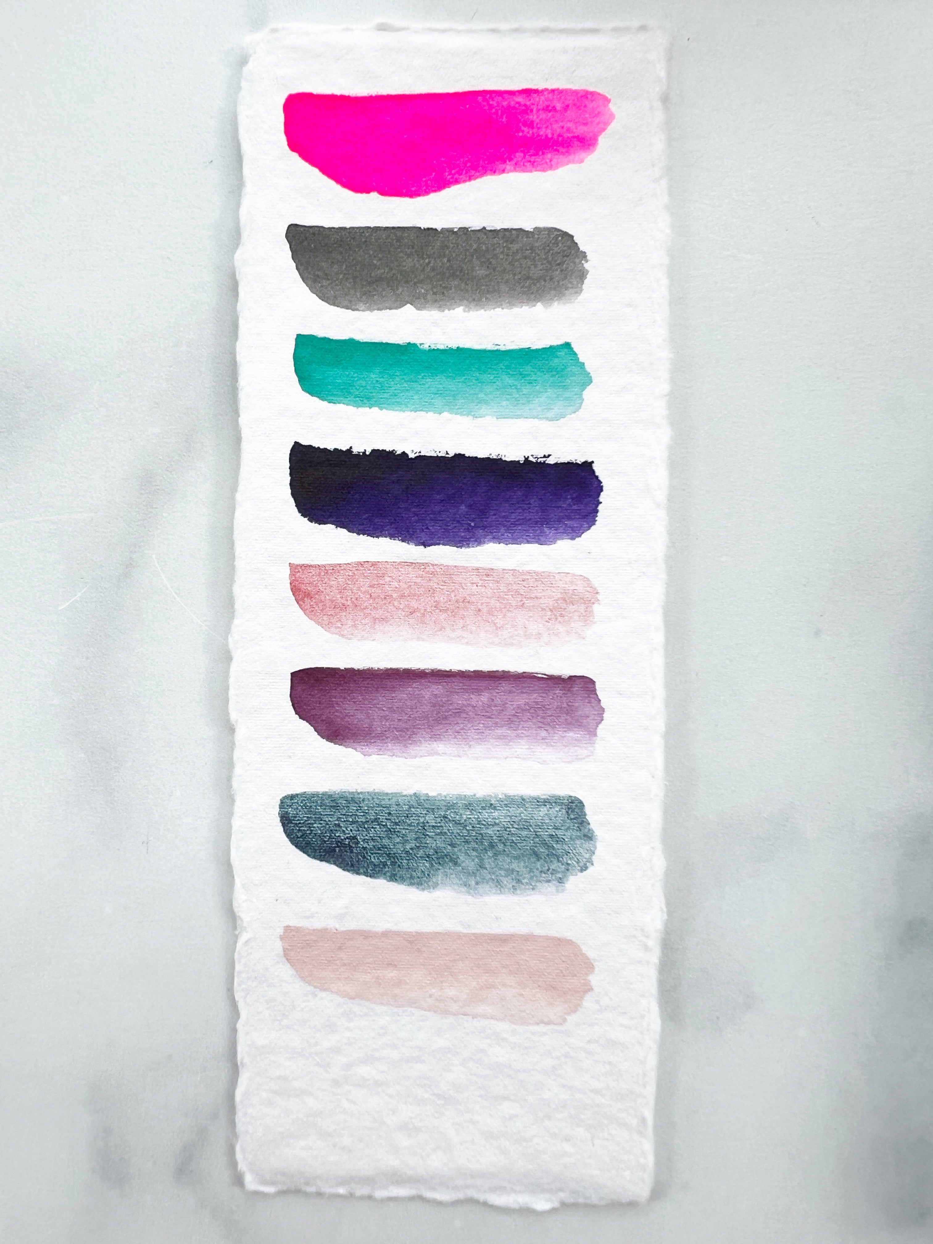 The Lucy Stone Set, a half pan set of handmade watercolors