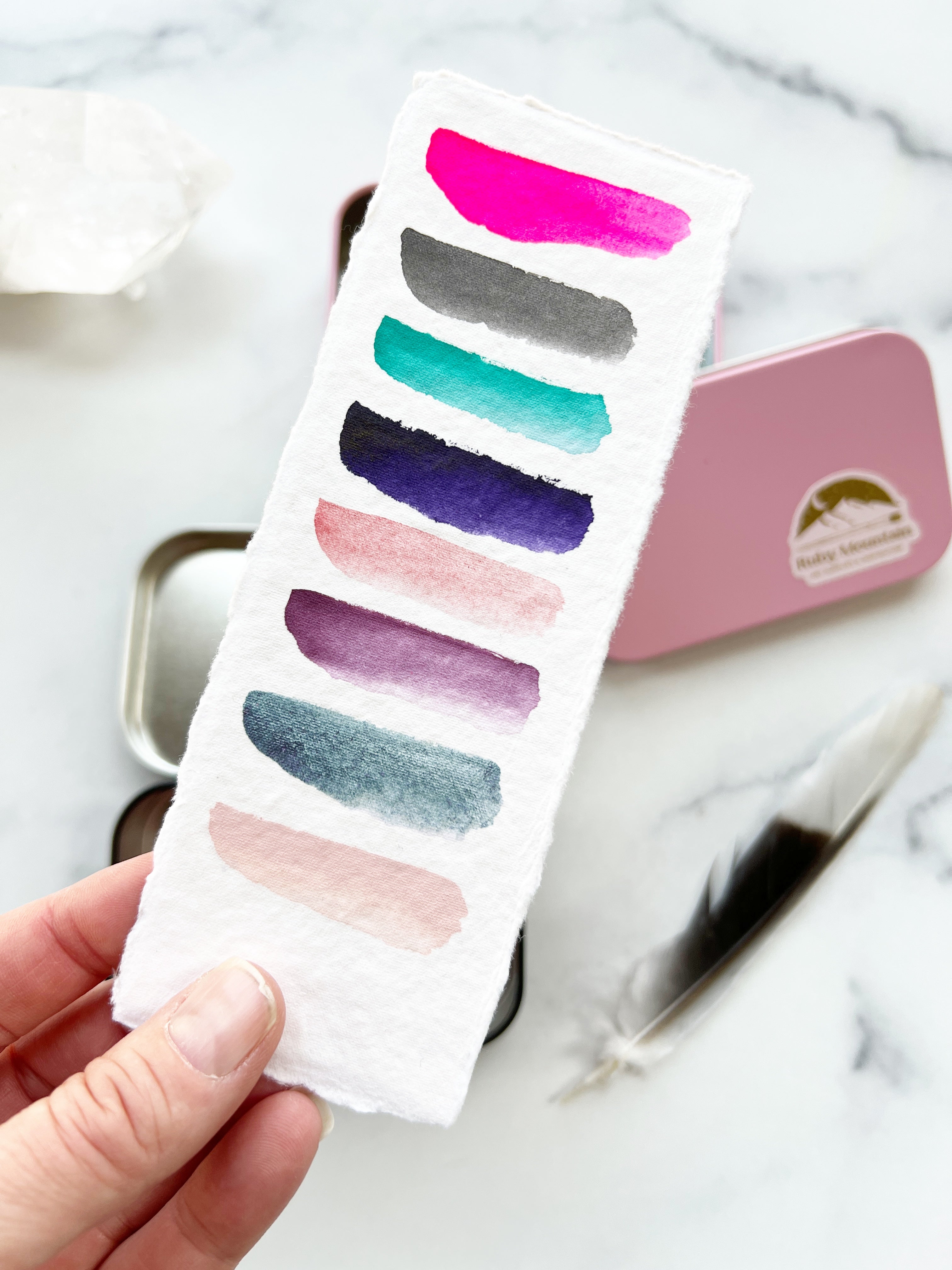The Lucy Stone Set, a half pan set of handmade watercolors