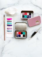 The Lucy Stone Set, a half pan set of handmade watercolors