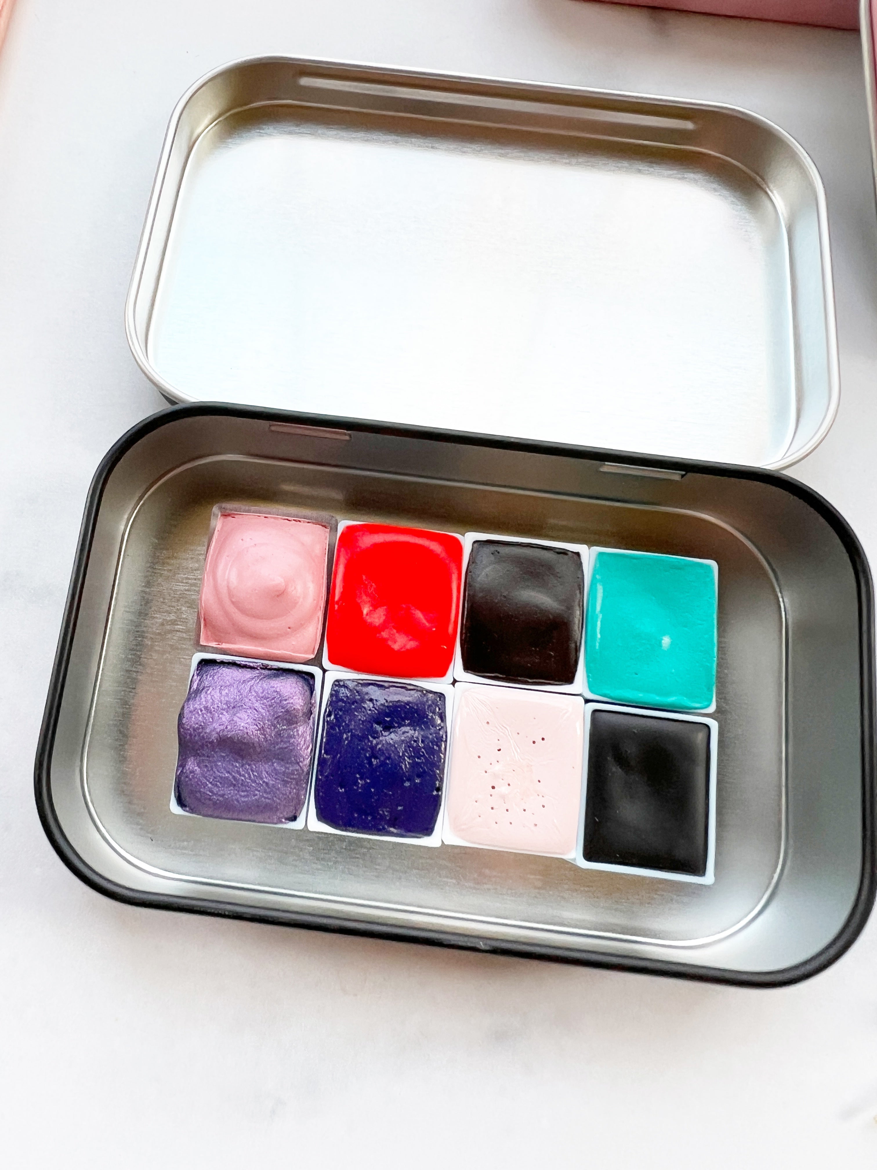 The Lucy Stone Set, a half pan set of handmade watercolors