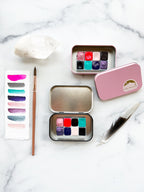 The Lucy Stone Set, a half pan set of handmade watercolors