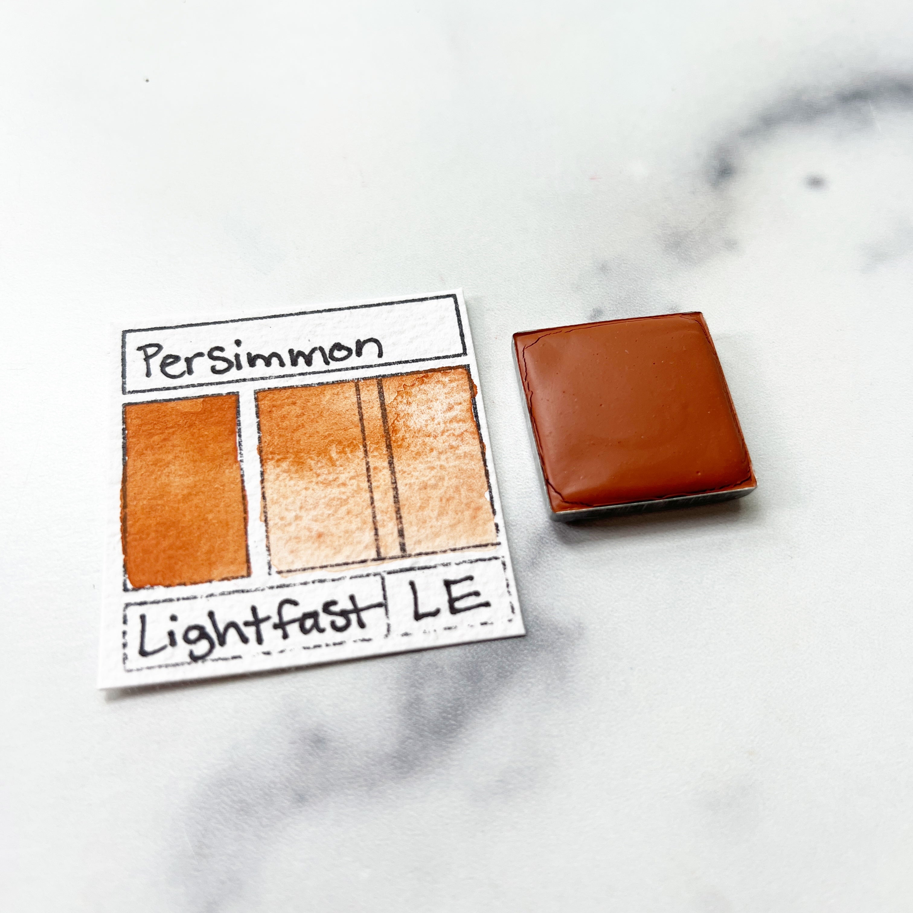 Persimmon. Individual pan of handmade watercolor paint