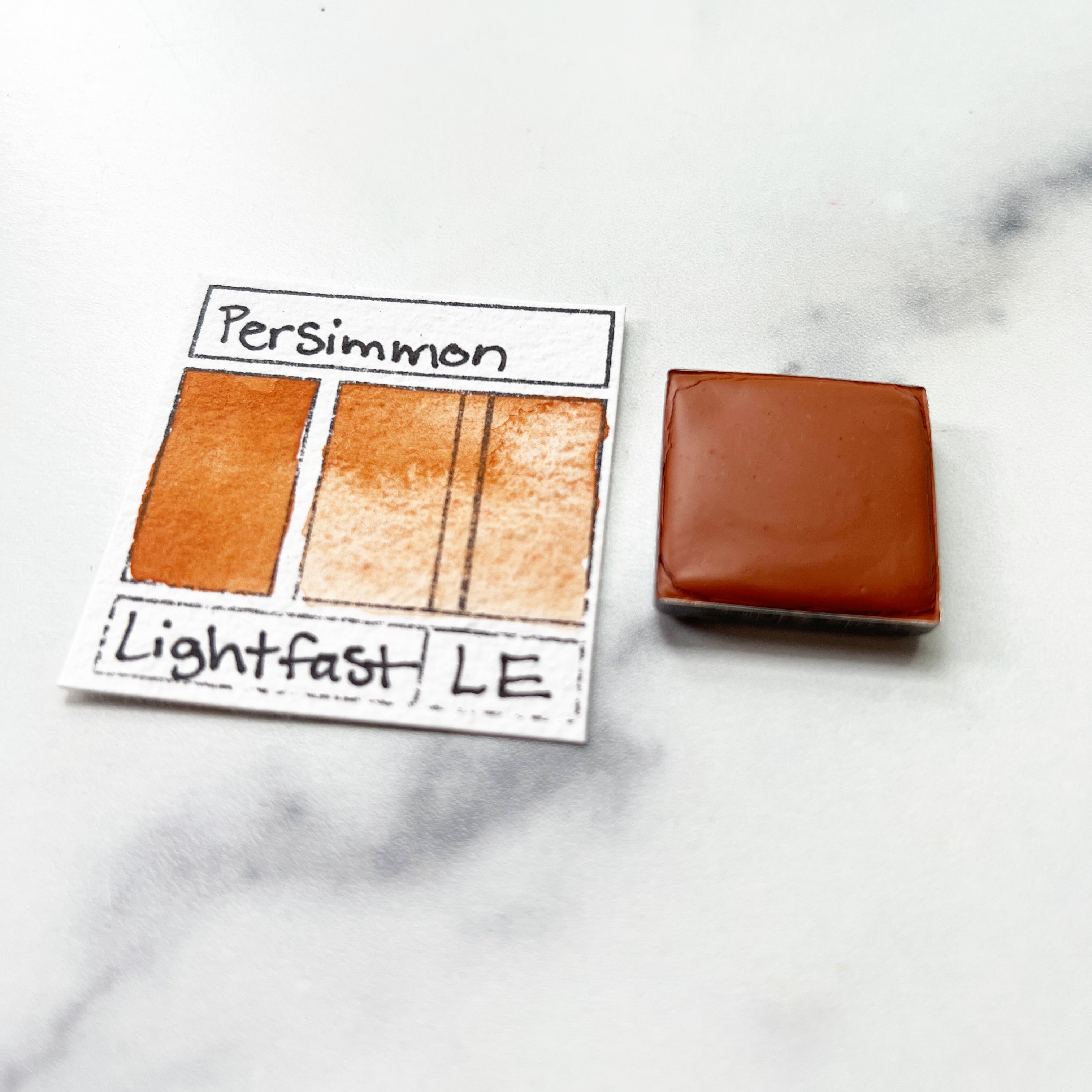 Persimmon. Individual pan of handmade watercolor paint
