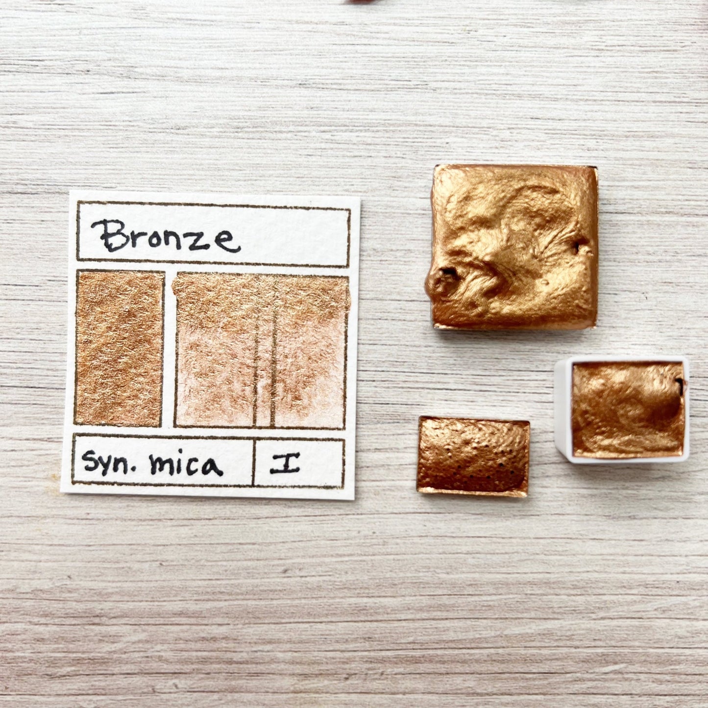 Bronze. Half pan, full pan or bottle cap of handmade watercolor paint