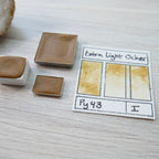 Extra Light Ocher. Half pan, full pan or bottle cap of handmade watercolor paint