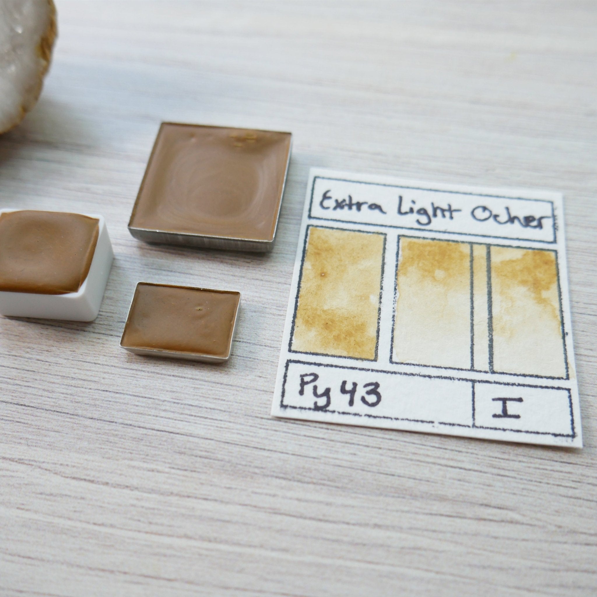 Extra Light Ocher. Half pan, full pan or bottle cap of handmade watercolor paint