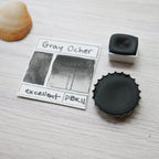 Gray Ocher. Half pan, full pan or bottle cap of handmade watercolor paint