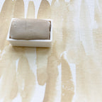 Titanium Buff. Half pan, full pan or bottle cap of handmade watercolor paint