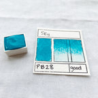 Sky. Half pan, full pan or bottle cap of handmade watercolor paint
