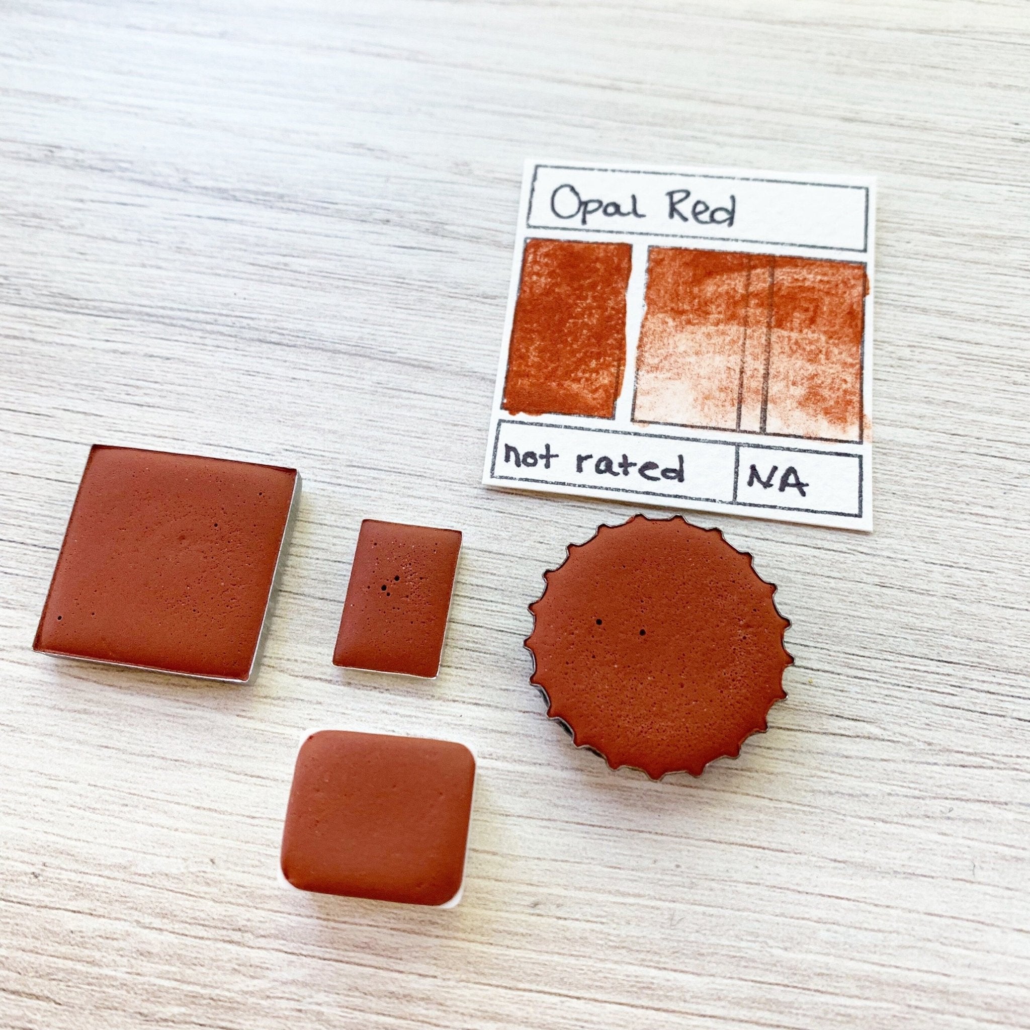 Opal Red. Half pan, full pan or bottle cap of handmade watercolor paint