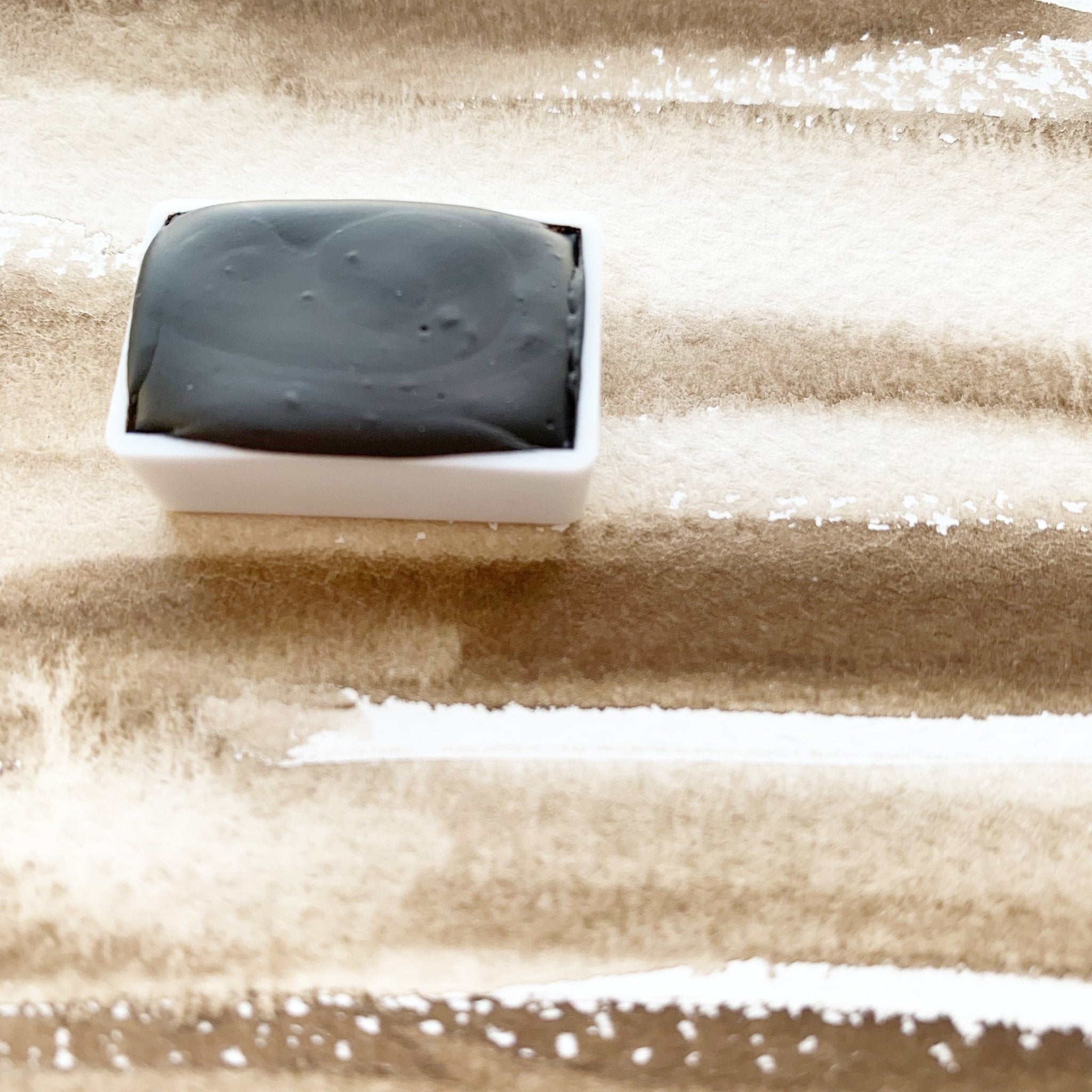 Raw Umber. Half pan, full pan or bottle cap of handmade watercolor paint